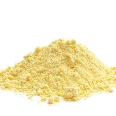 Maize meal isolated on a white background.